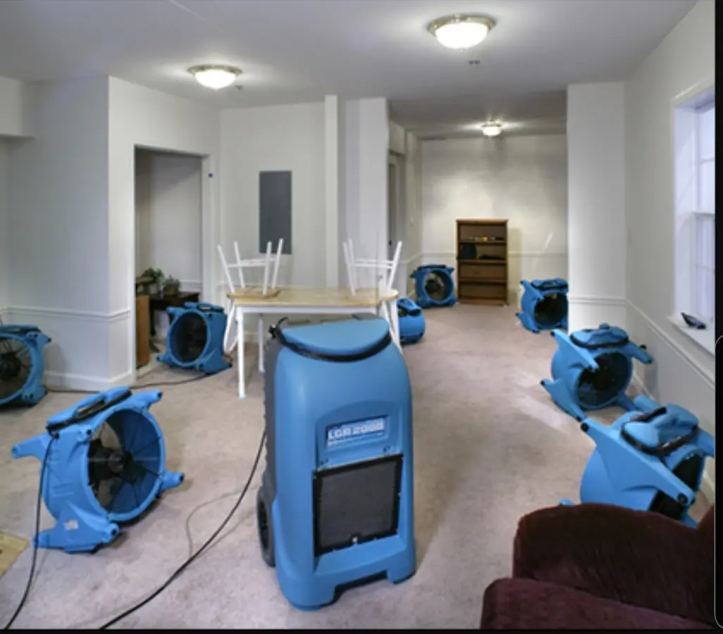 Air movers and dehumidifier setup for Water Damage Restoration in Tuckahoe